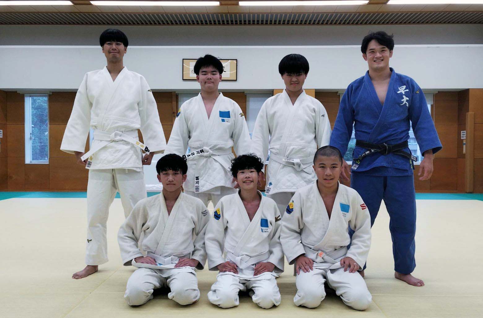 Kouta Takayama coaches judo at Tokyo Toshi University school